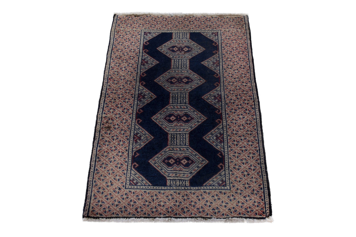 Persian Torkaman accent rug in navy and greige, view 3 of 10