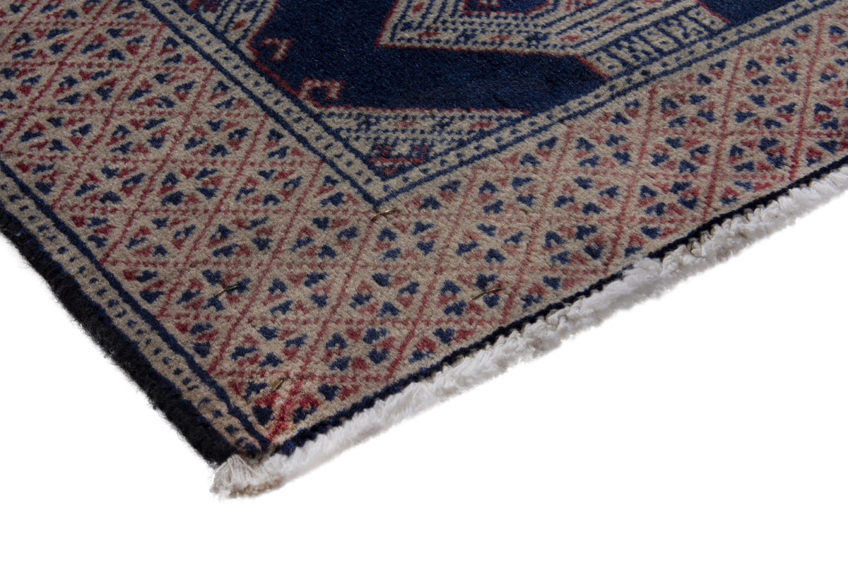 Persian Torkaman accent rug in navy and greige, view 6 of 10