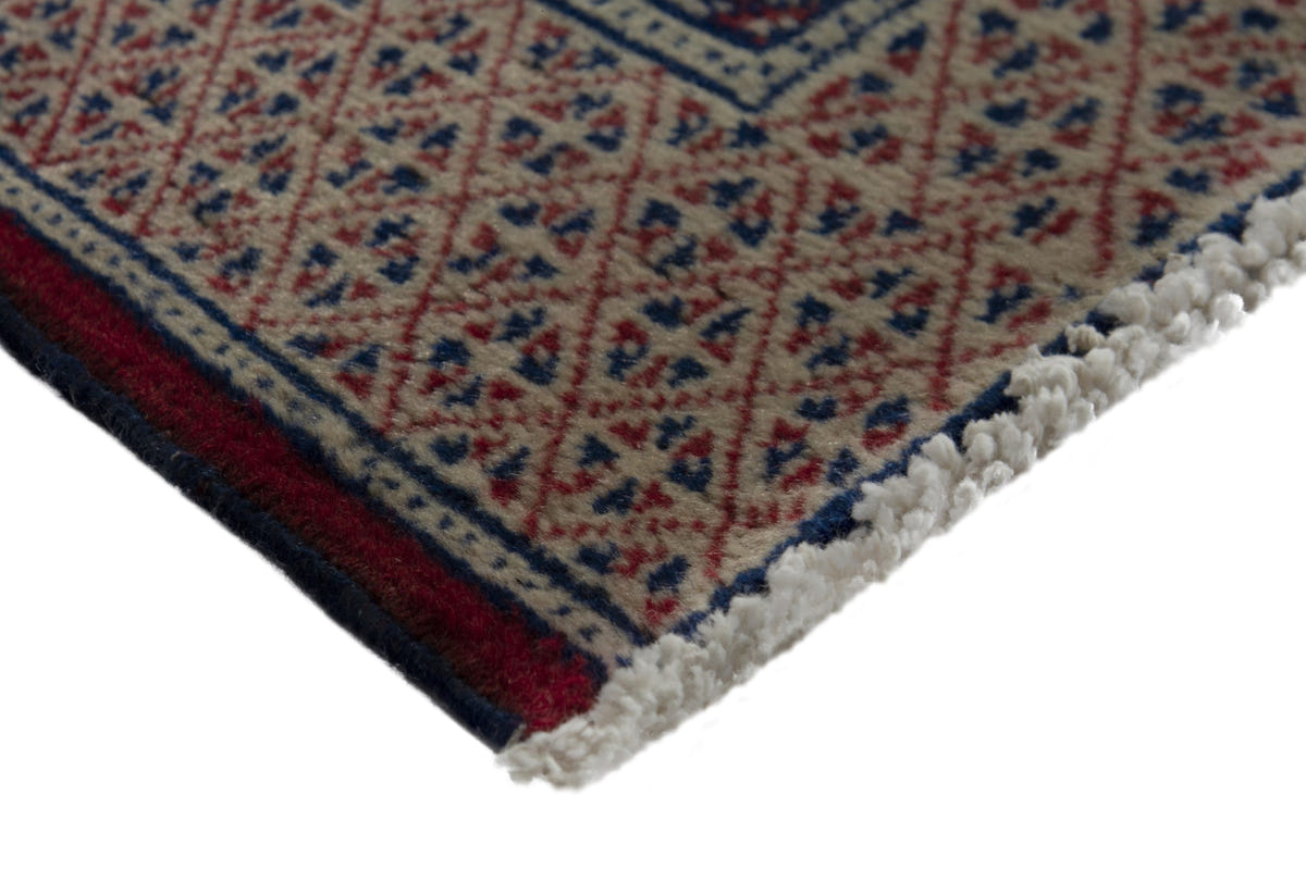 Persian Torkaman accent rug in navy and greige, view 6 of 9
