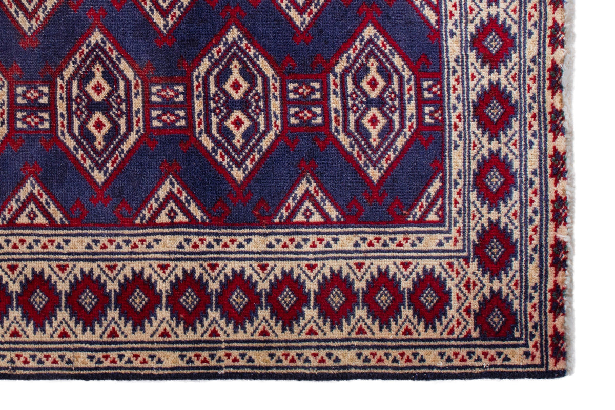 Persian Torkaman accent rug in navy and cream, view 5 of 9