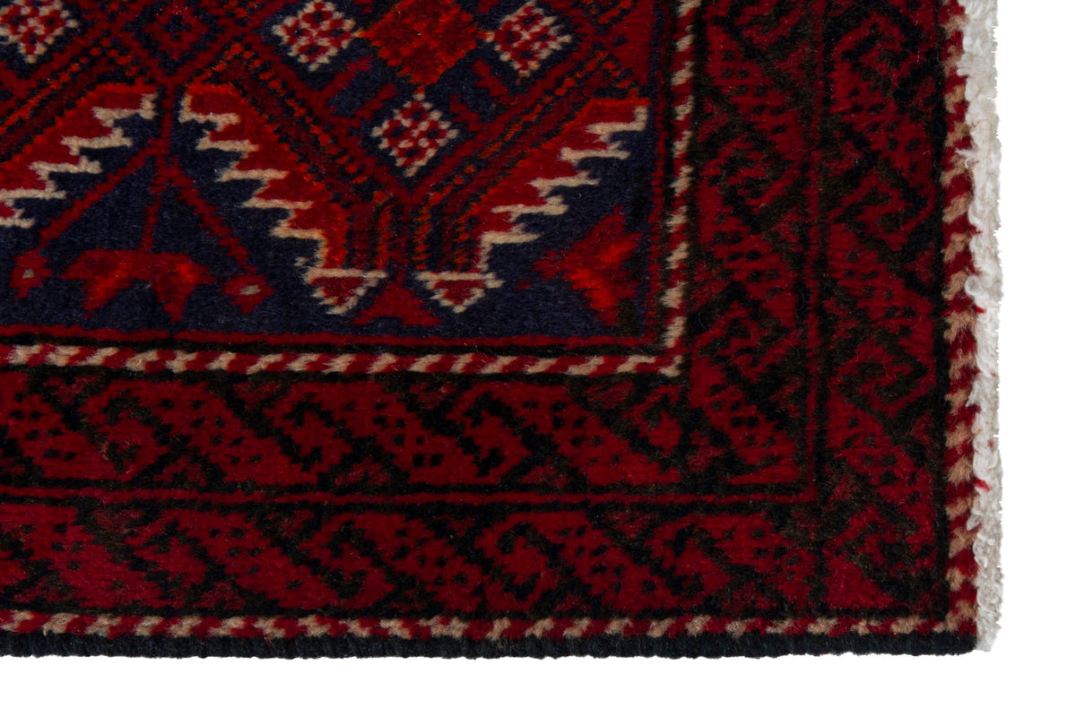 Persian Baluch accent rug in deep red and black, view 5 of 9