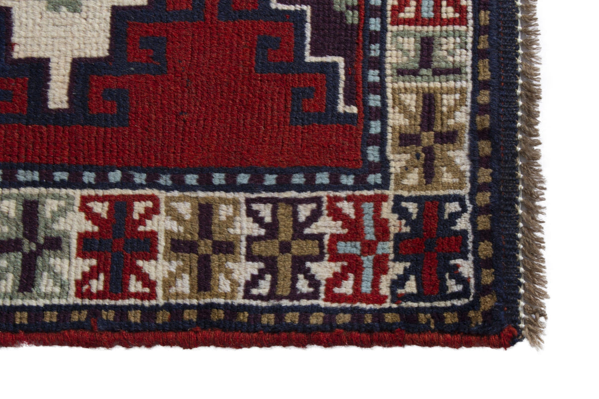 Persian Ghoochan accent rug in deep red and cream, view 5 of 10