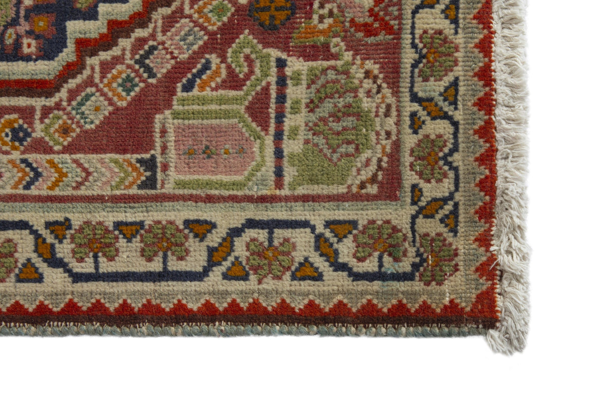 Persian Shiraz accent rug in faded red and navy, view 5 of 10