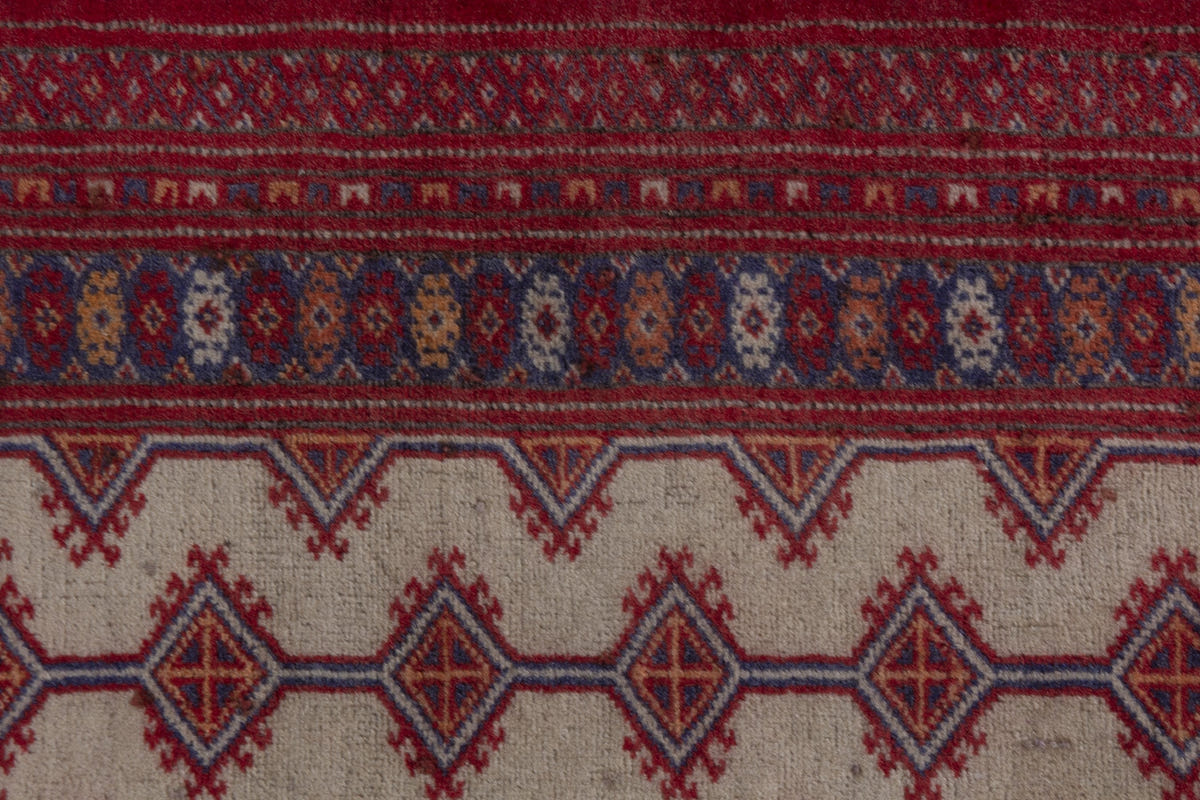 Persian Baluch accent rug in cream and deep red, view 8 of 9