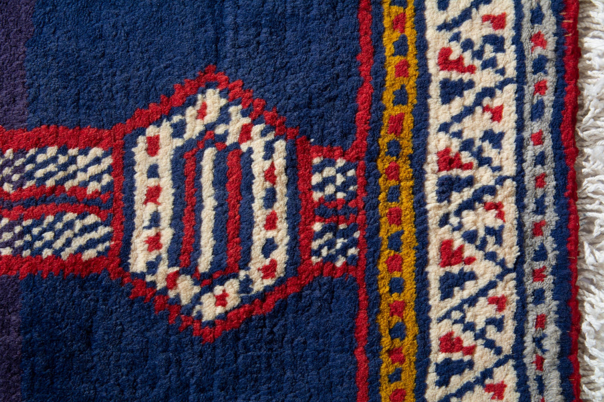 Persian Baluch accent rug in navy and cream, view 8 of 9