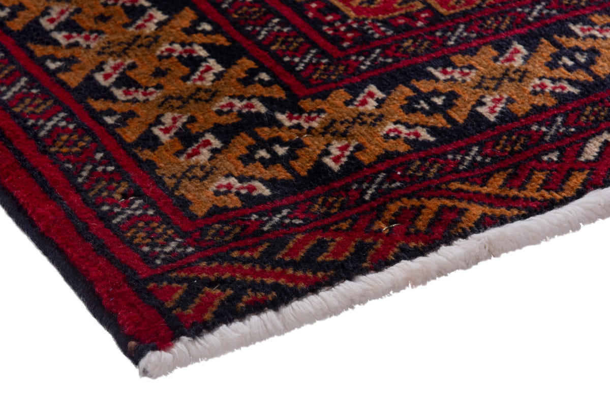 Persian Torkaman accent rug in deep red and ochre, view 6 of 9