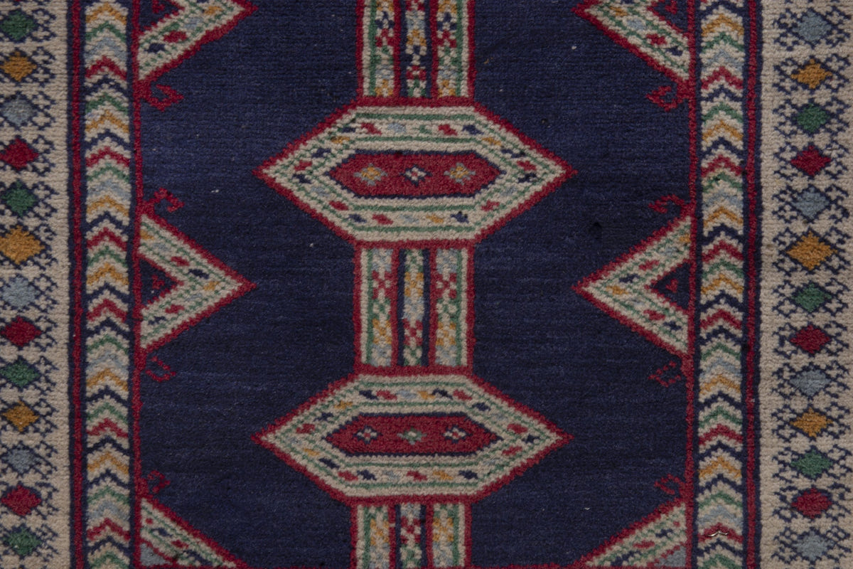 Persian Baluch accent rug in navy and cream, view 7 of 9