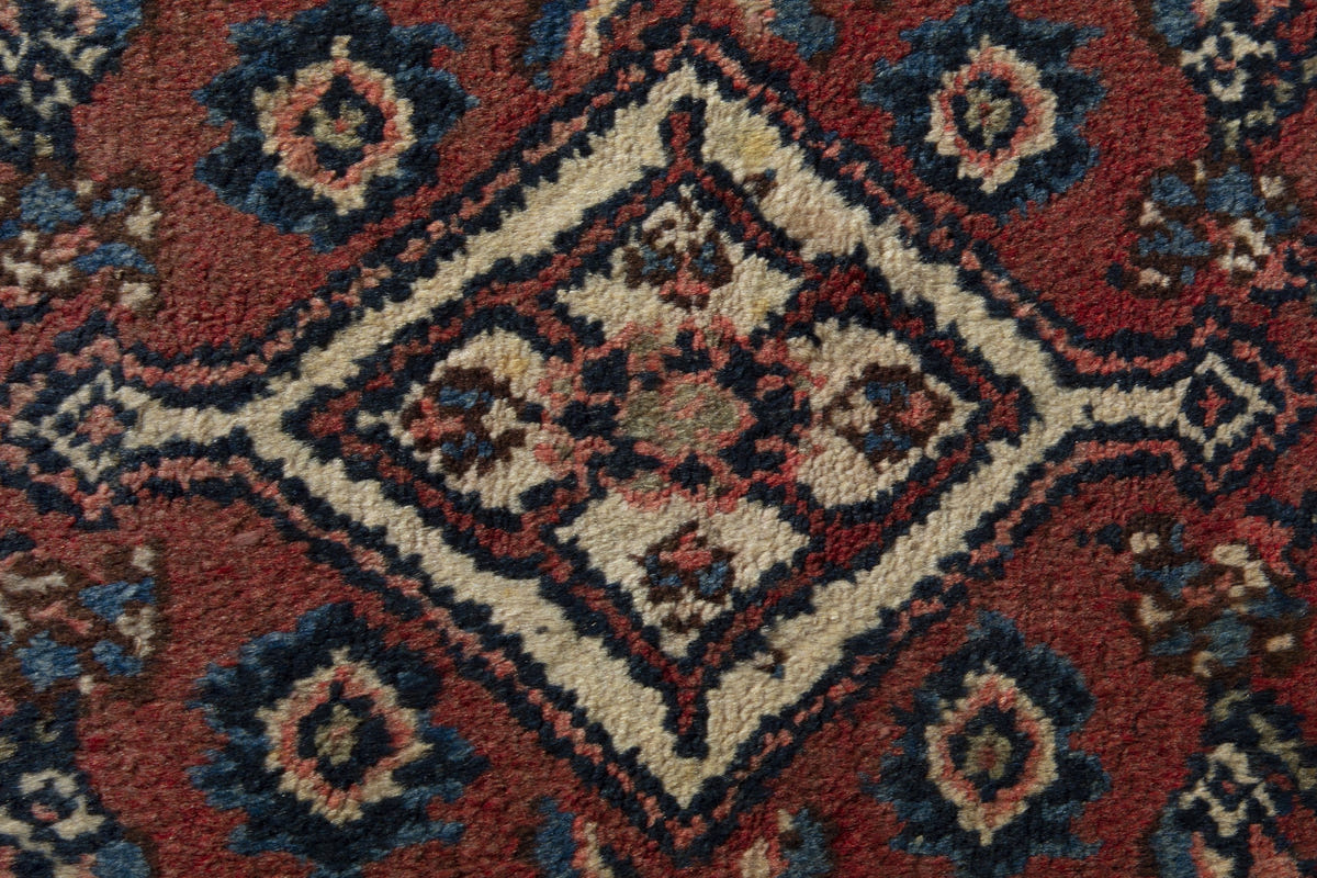 Persian Hamadan accent rug in brick and navy, view 7 of 10