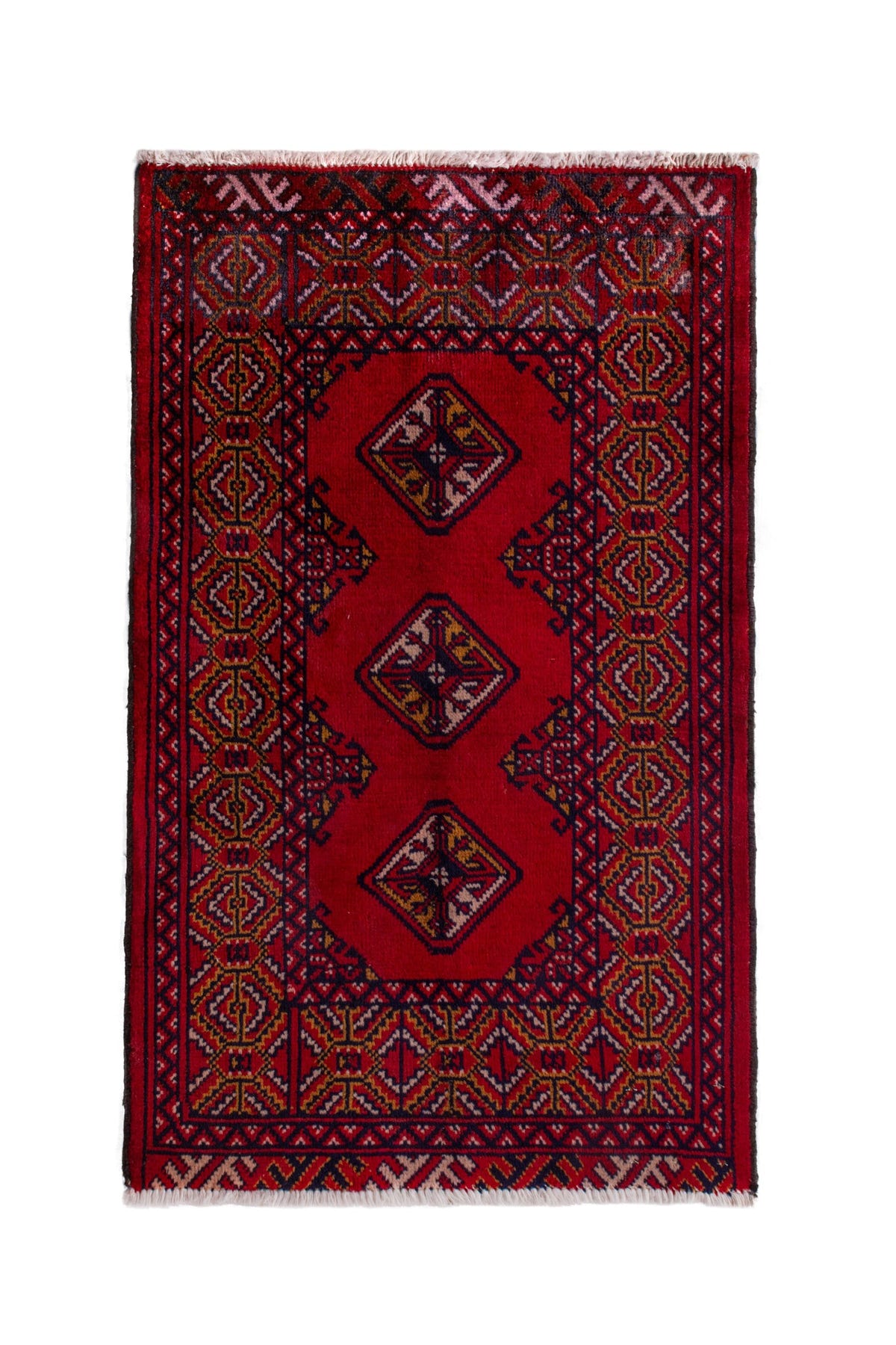 Persian Torkaman accent rug in deep red and navy, view 2 of 9