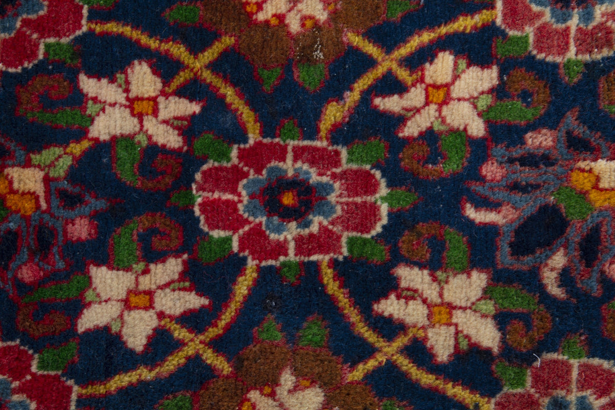 Persian Varamin accent rug in navy and deep red, view 7 of 9