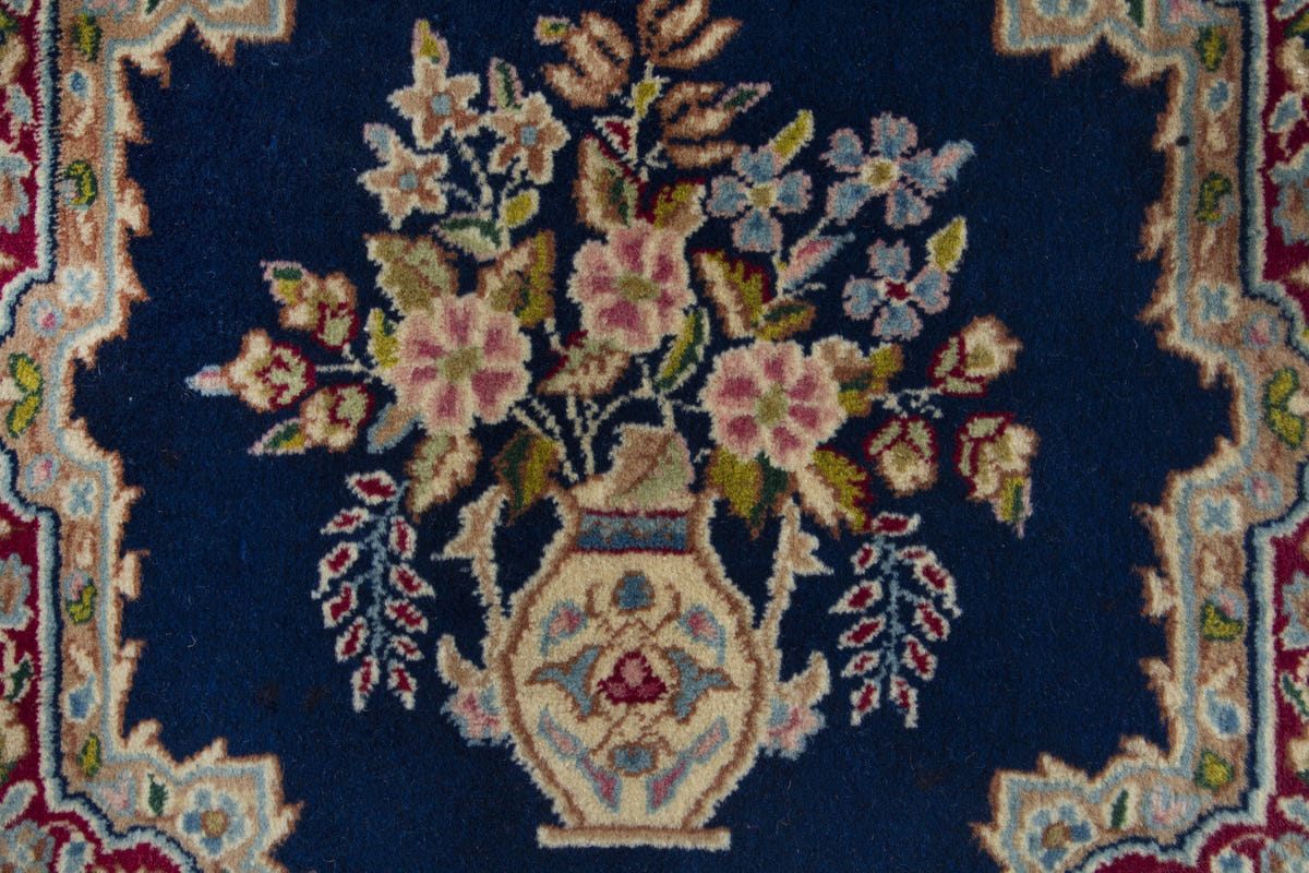 Persian Kerman accent rug in navy and burgundy, view 7 of 9
