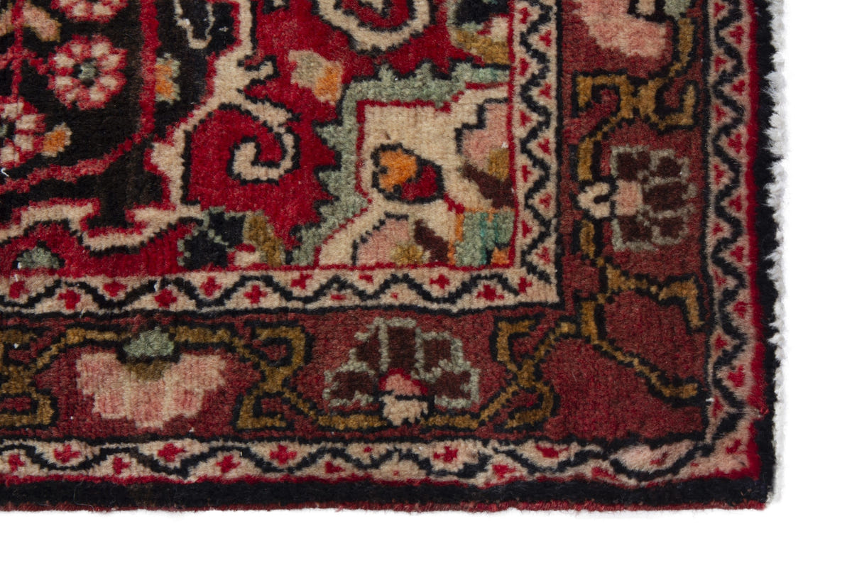 Persian Malayer accent rug in black and deep red, view 5 of 10