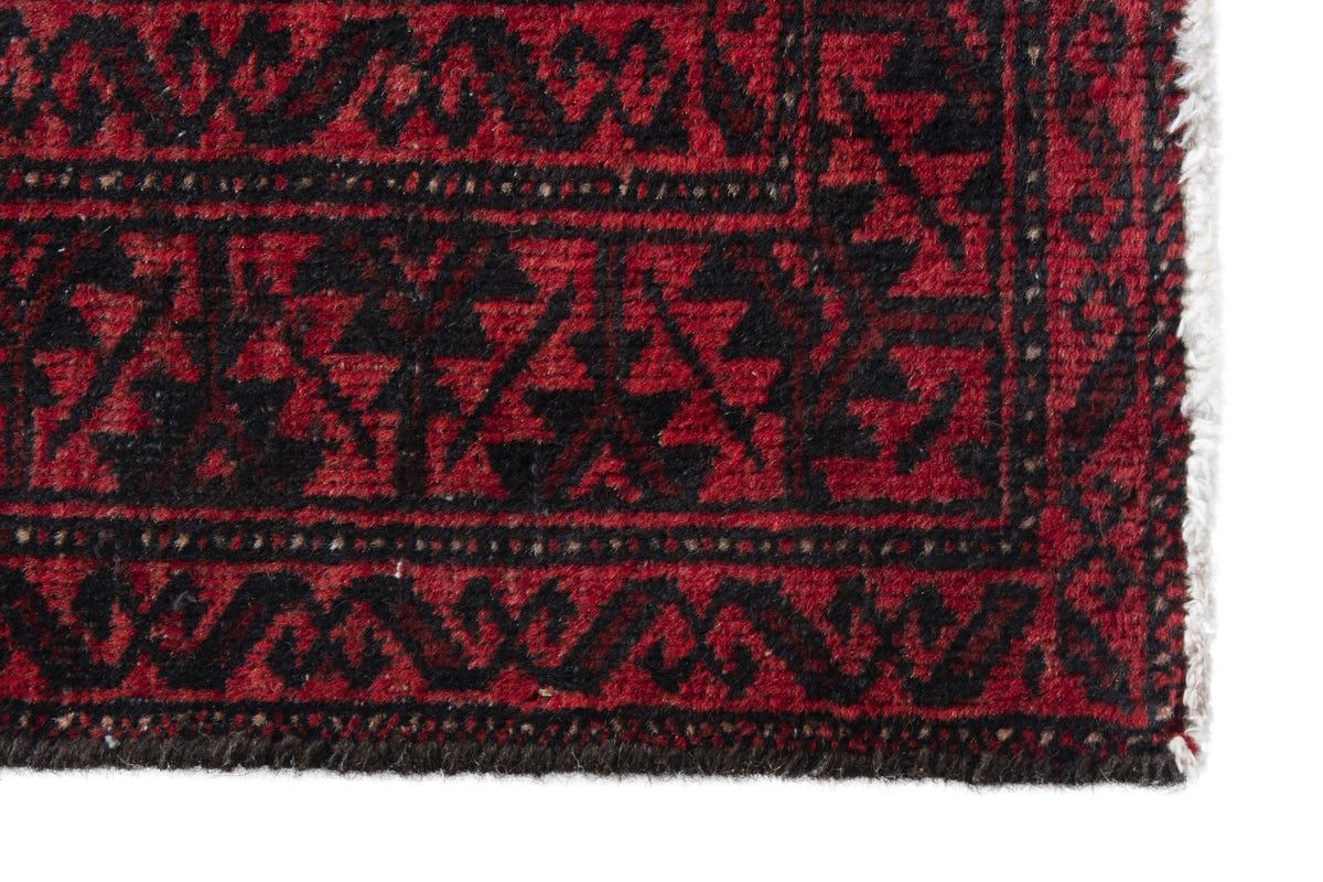 Persian Baluch accent rug in deep red and black, view 5 of 9