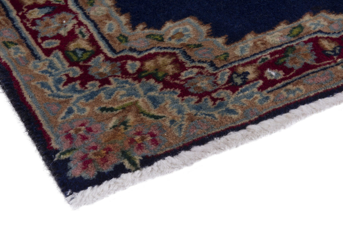 Persian Kerman accent rug in navy and burgundy, view 6 of 8