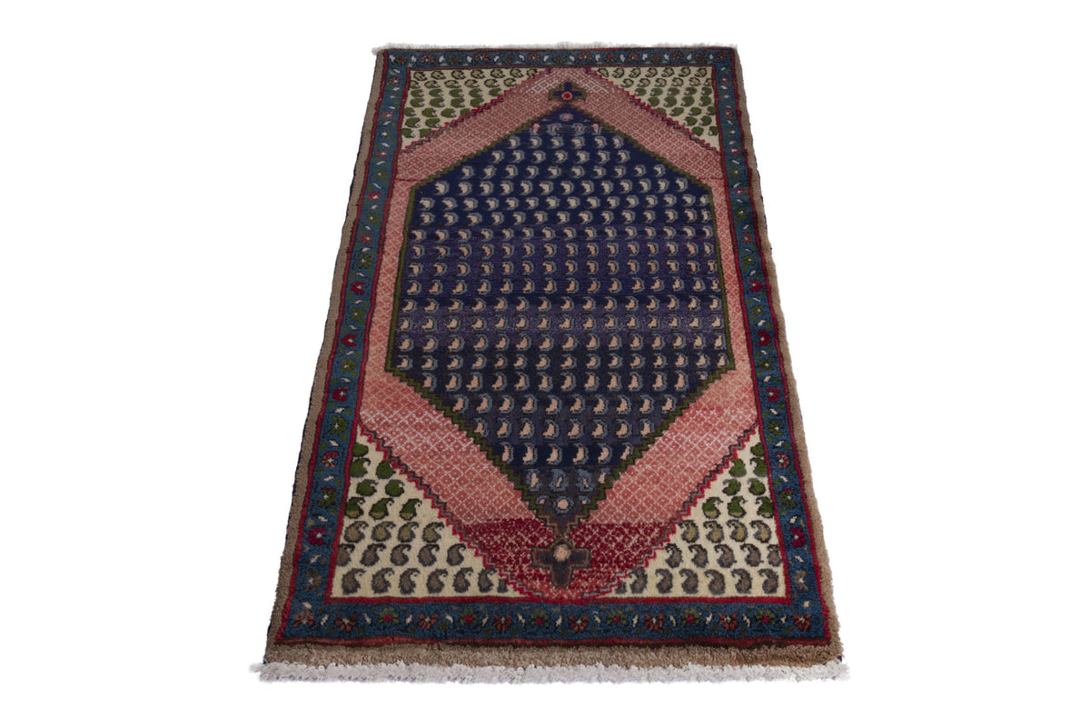 Persian Songhor accent rug in navy and dusty rose, view 4 of 9