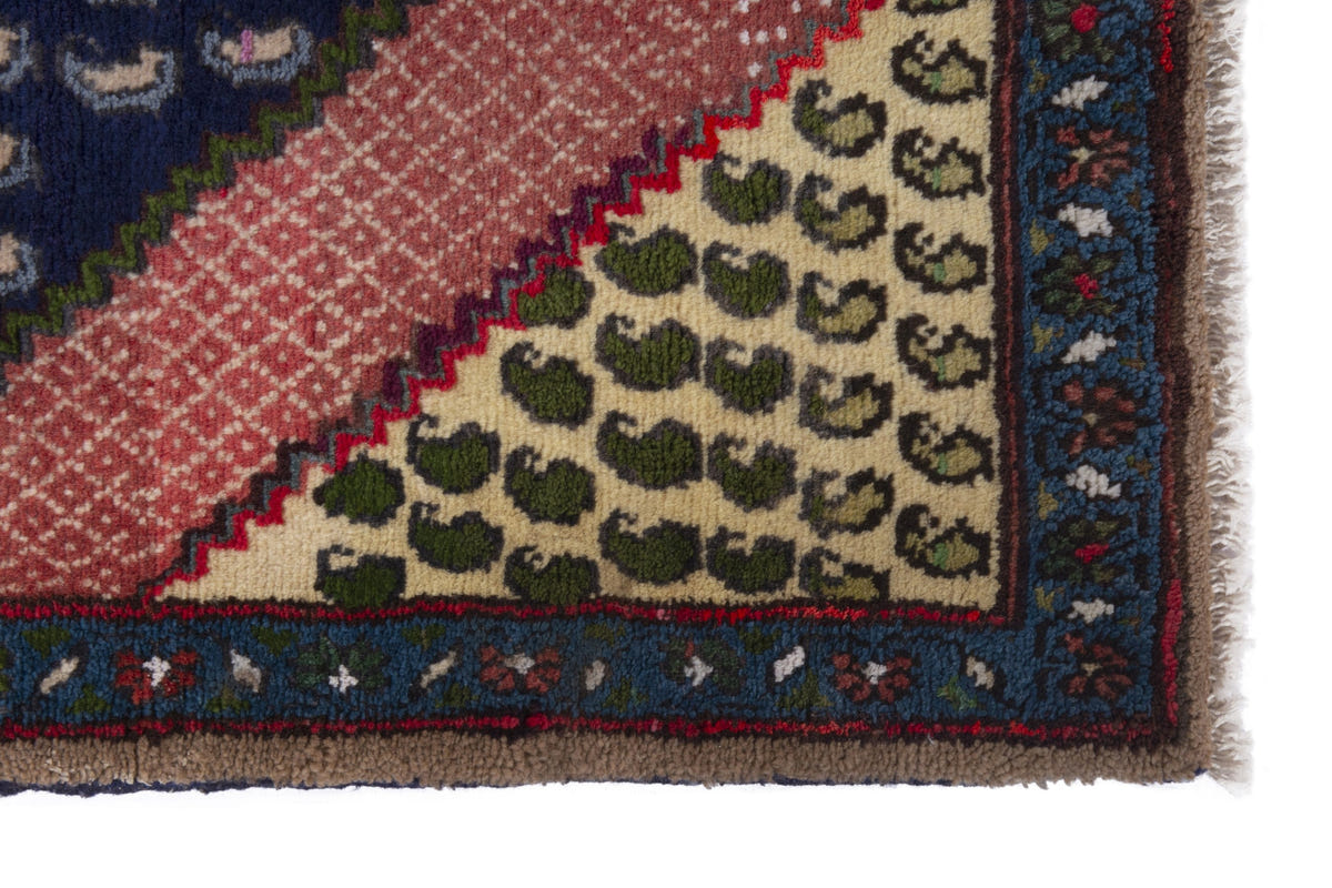 Persian Songhor accent rug in navy and dusty rose, view 5 of 9