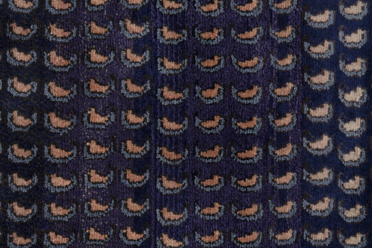 Persian Songhor accent rug in navy and dusty rose, view 8 of 9