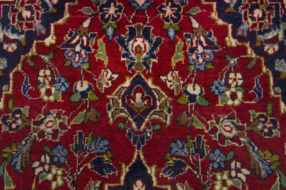 Persian Kashan accent rug in deep red and navy, view 7 of 10
