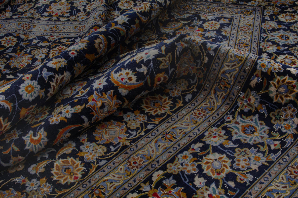 Persian Kashan oversized rug in navy and cream, view 16 of 20