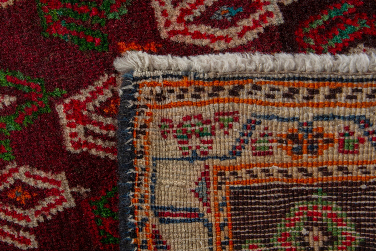 Persian Shiraz accent rug in deep red and burnt orange, view 6 of 8