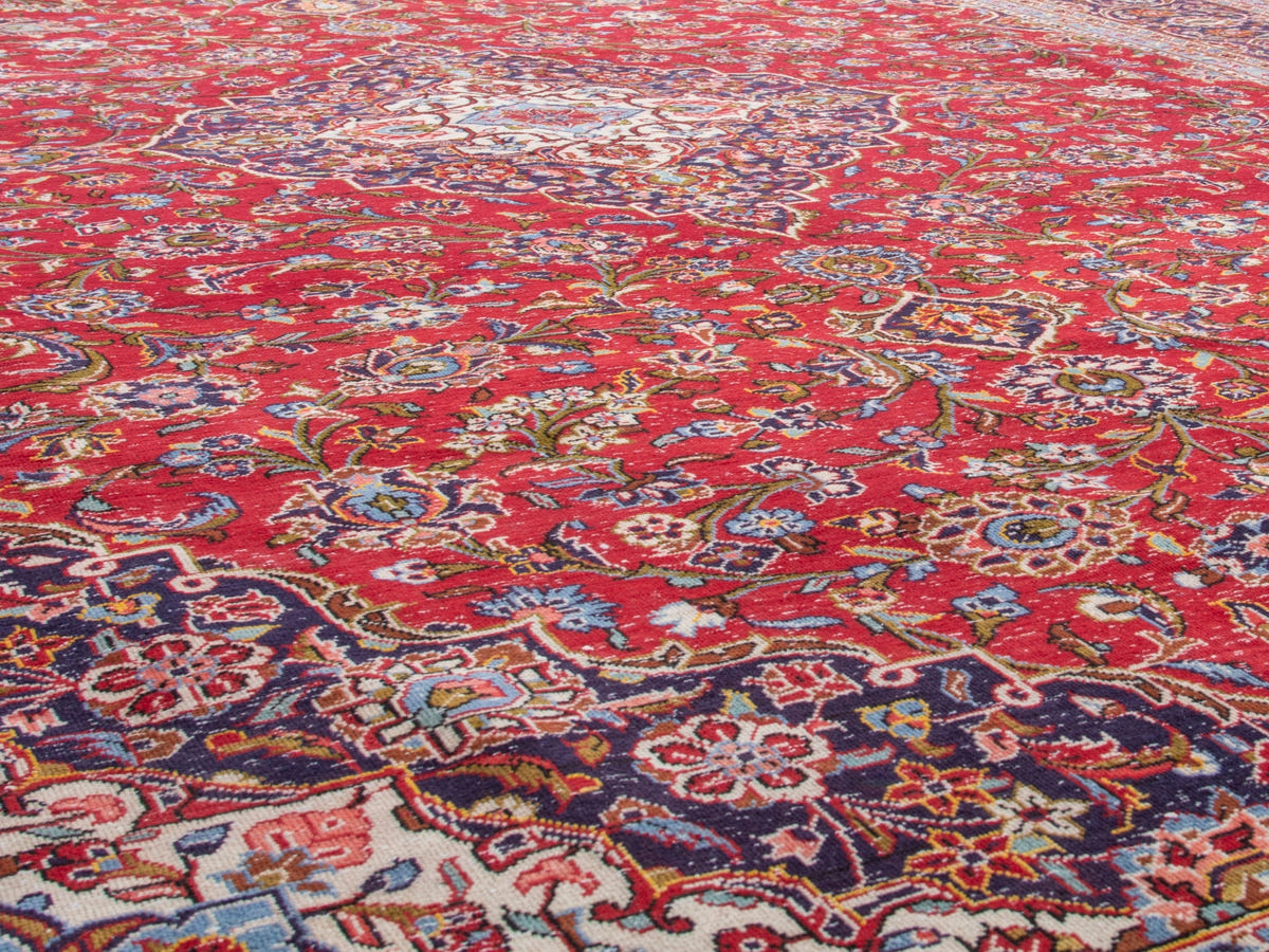Persian Kashan oversized rug in deep red and navy, view 11 of 20