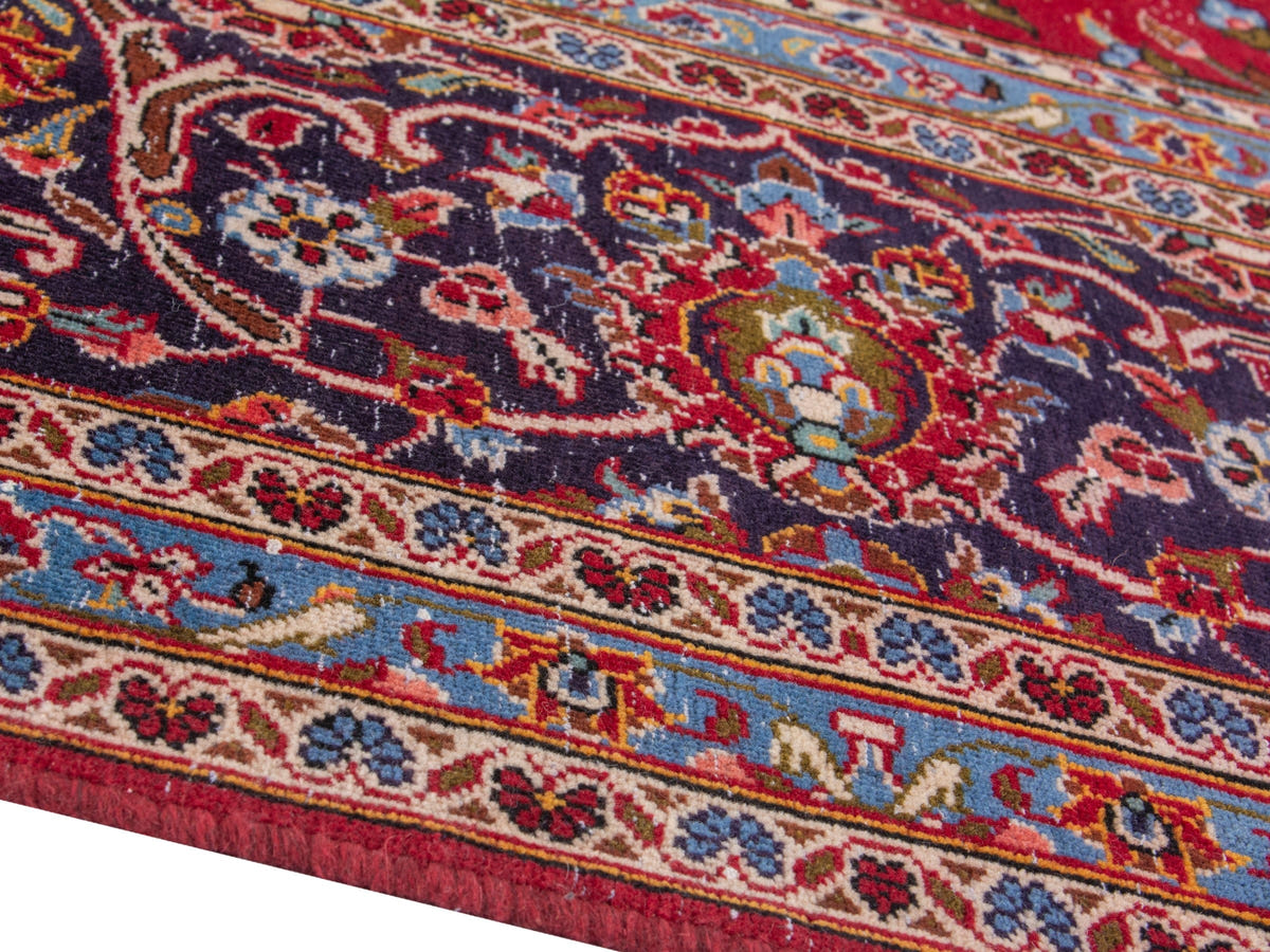 Persian Kashan oversized rug in deep red and navy, view 9 of 20