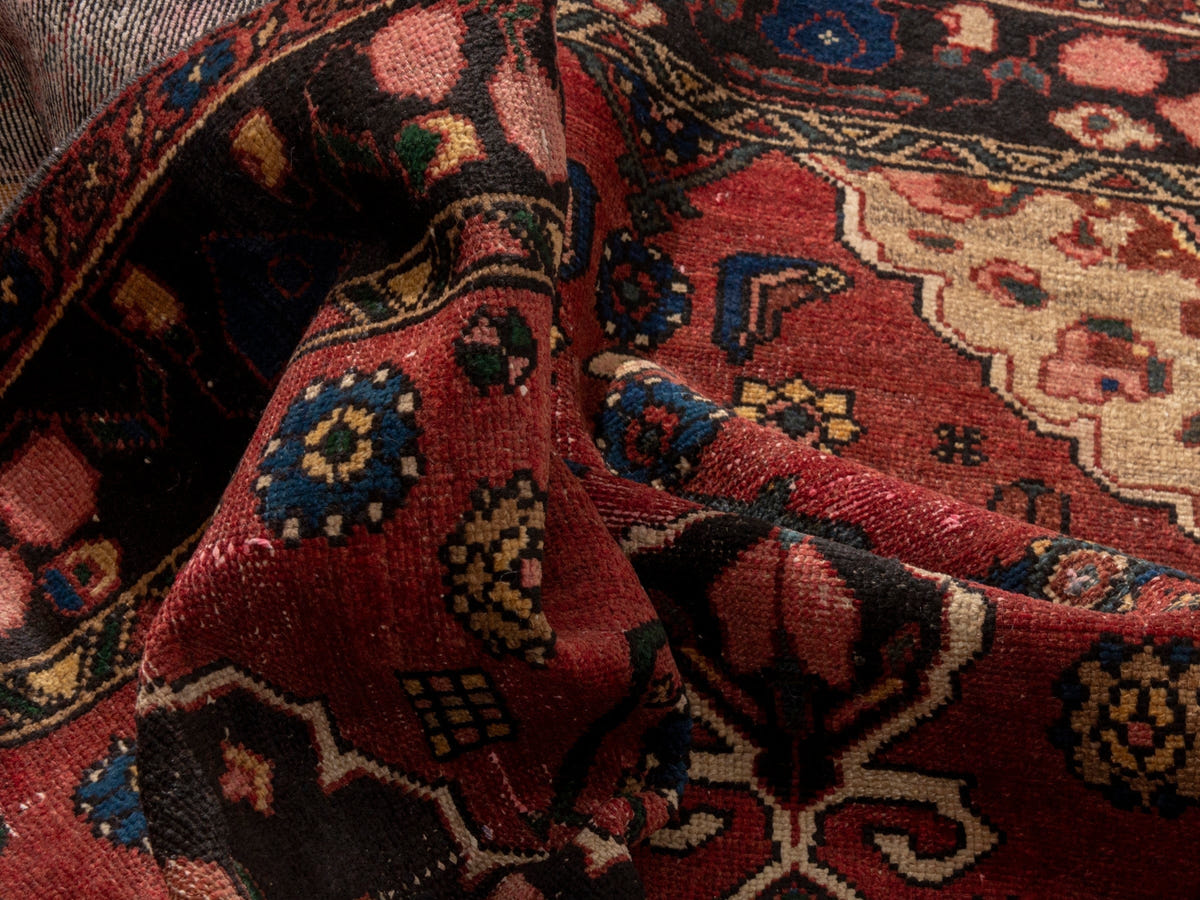Persian Zanjan area rug in deep red and black, view 18 of 20