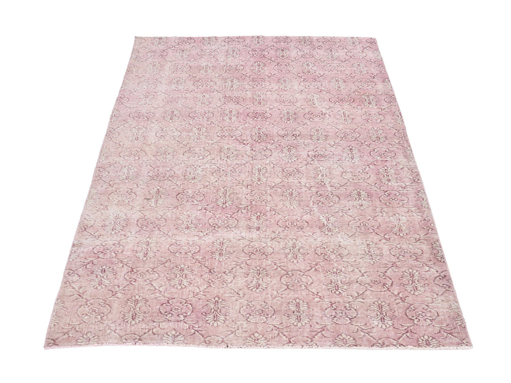 Turkish Isparta area rug in muted pink and dusty rose