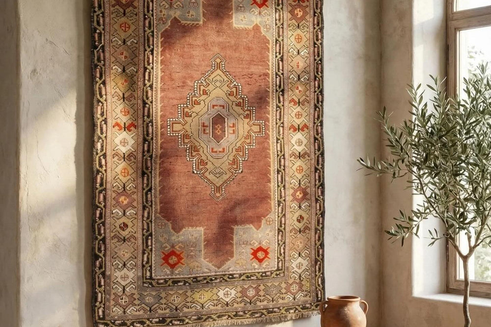 A Persian medallion rug beside a geometric Anatolian weave