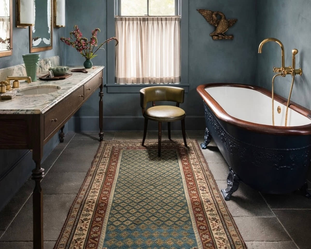 Vintage Persian botteh runner rug in a bathroom