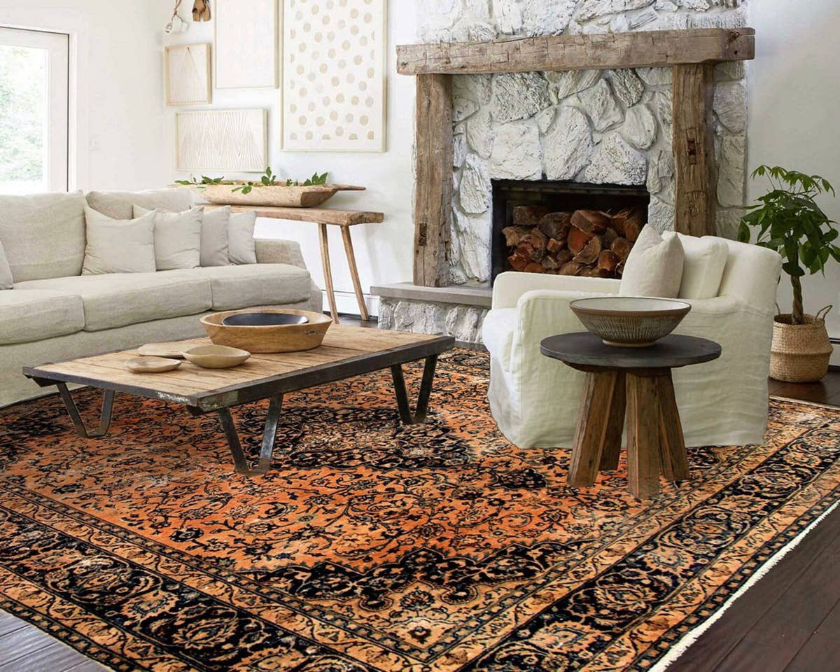 Vintage orange rug in a living room