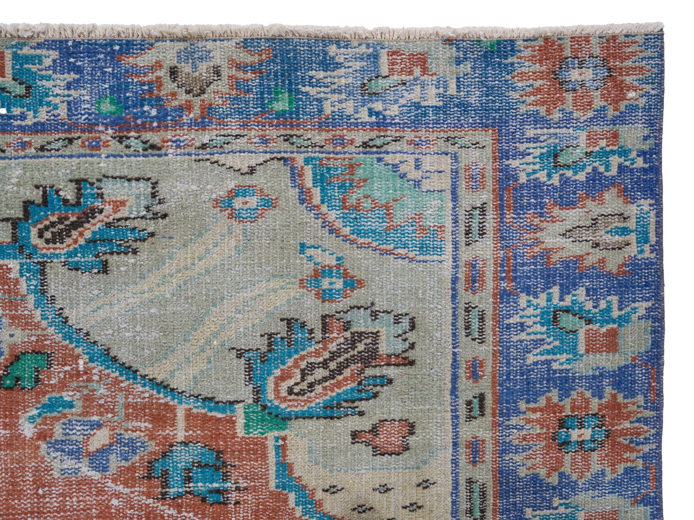 Turkish Manisa area rug in rust and navy, view 8 of 10