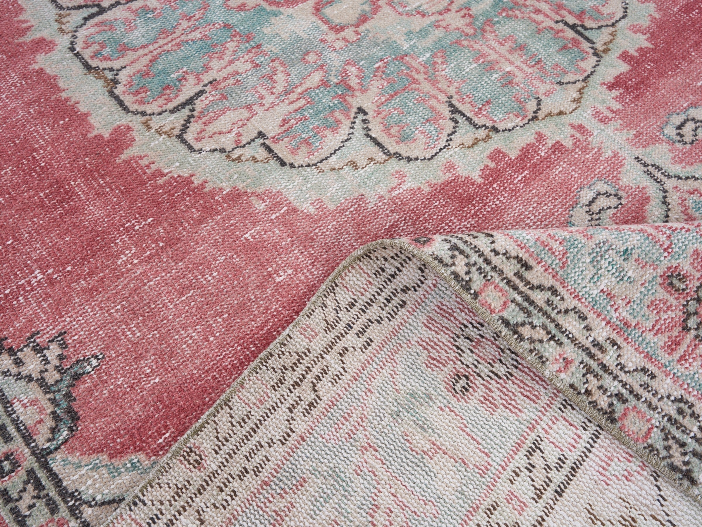 Turkish Manisa area rug in rose and cream, view 9 of 10