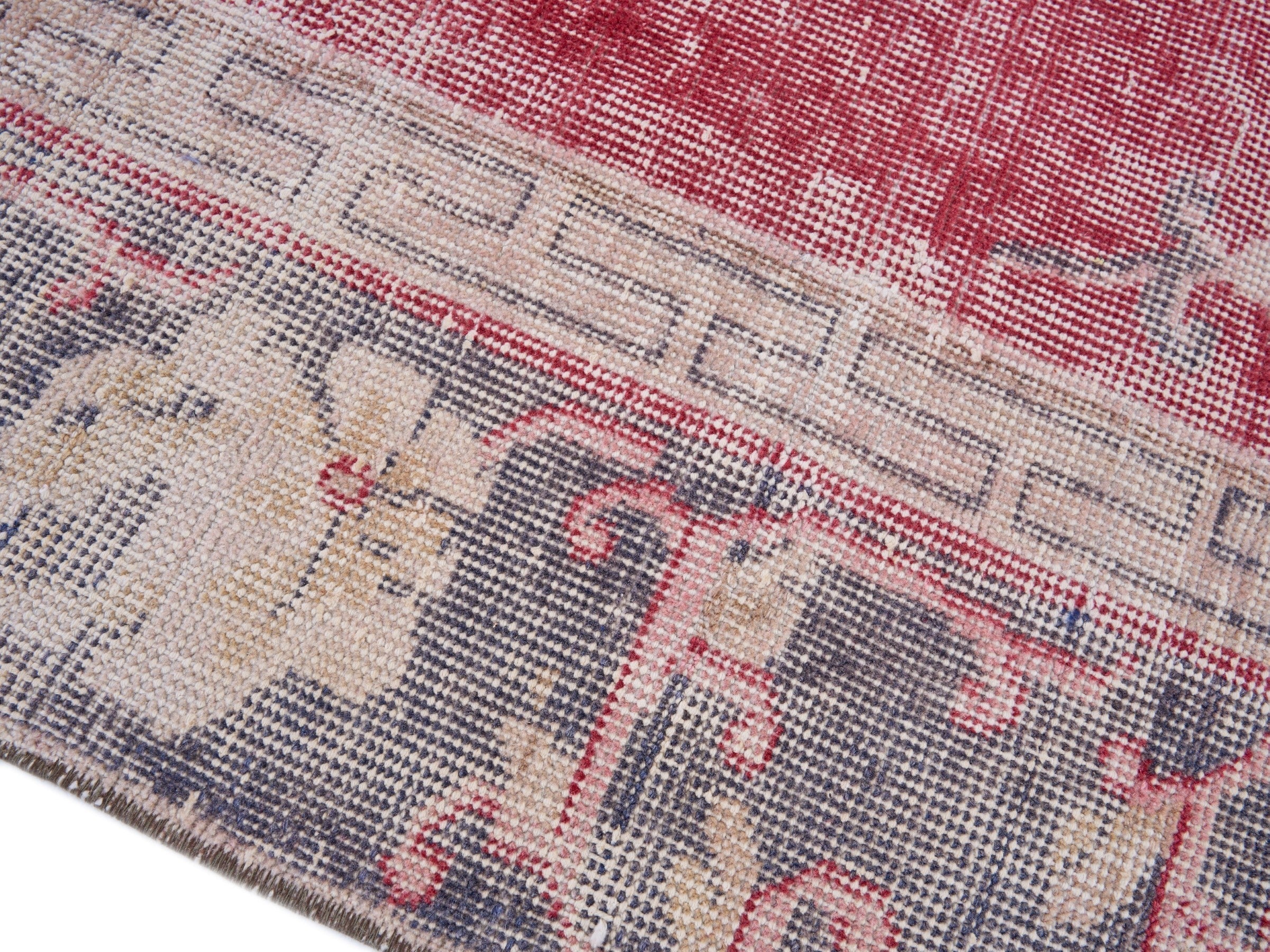 Turkish Isparta area rug in faded red and slate blue, view 6 of 10