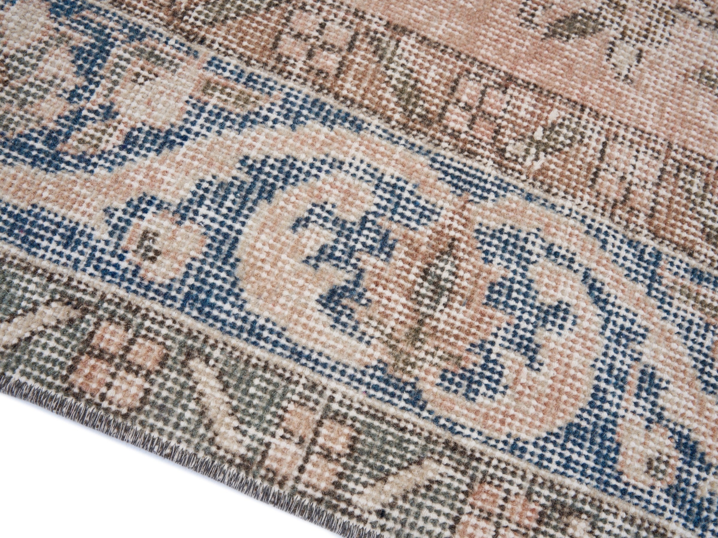 Turkish Isparta area rug in muted pink and denim, view 6 of 10