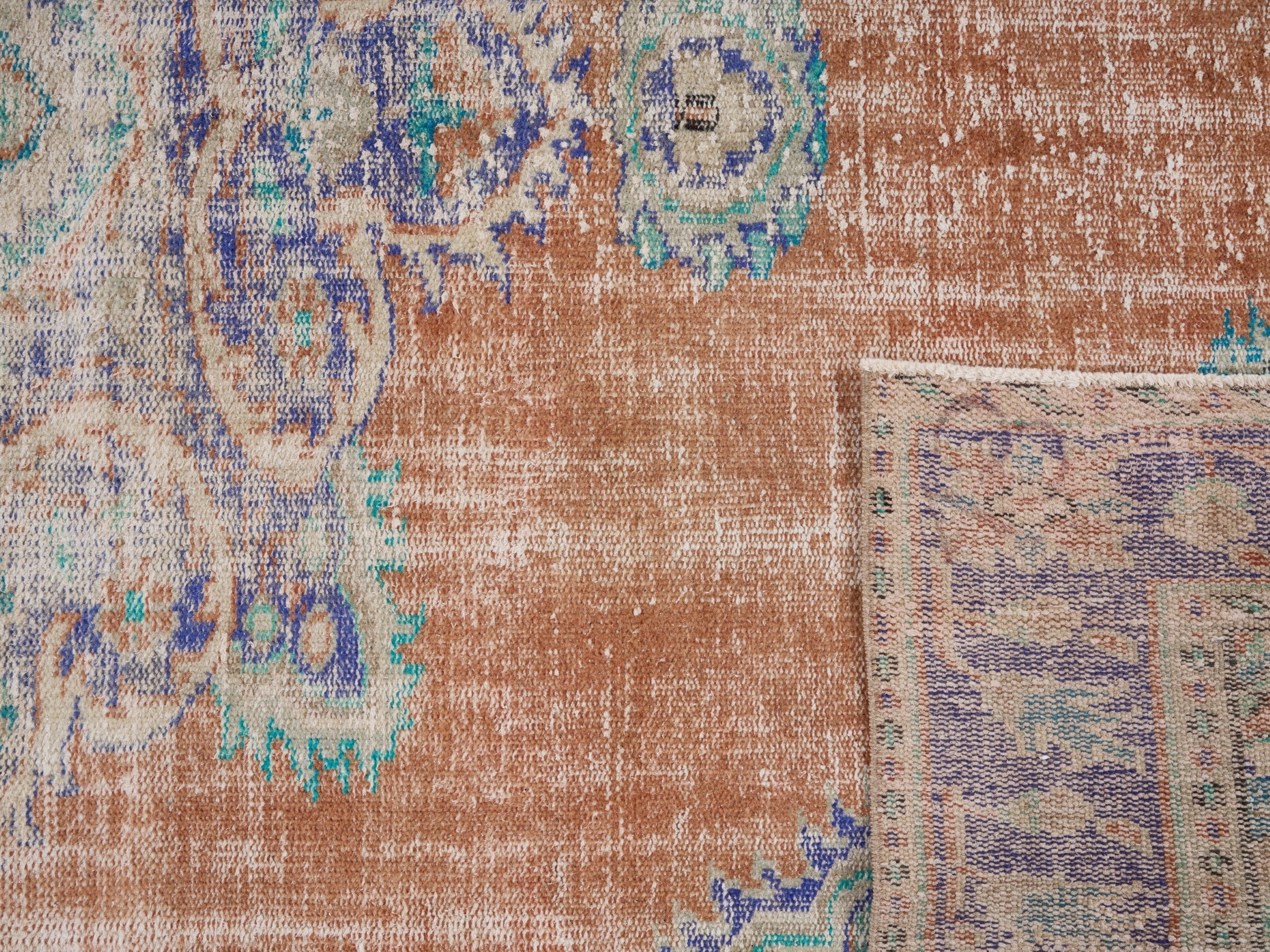 Turkish Manisa area rug in terracotta and navy, view 10 of 10