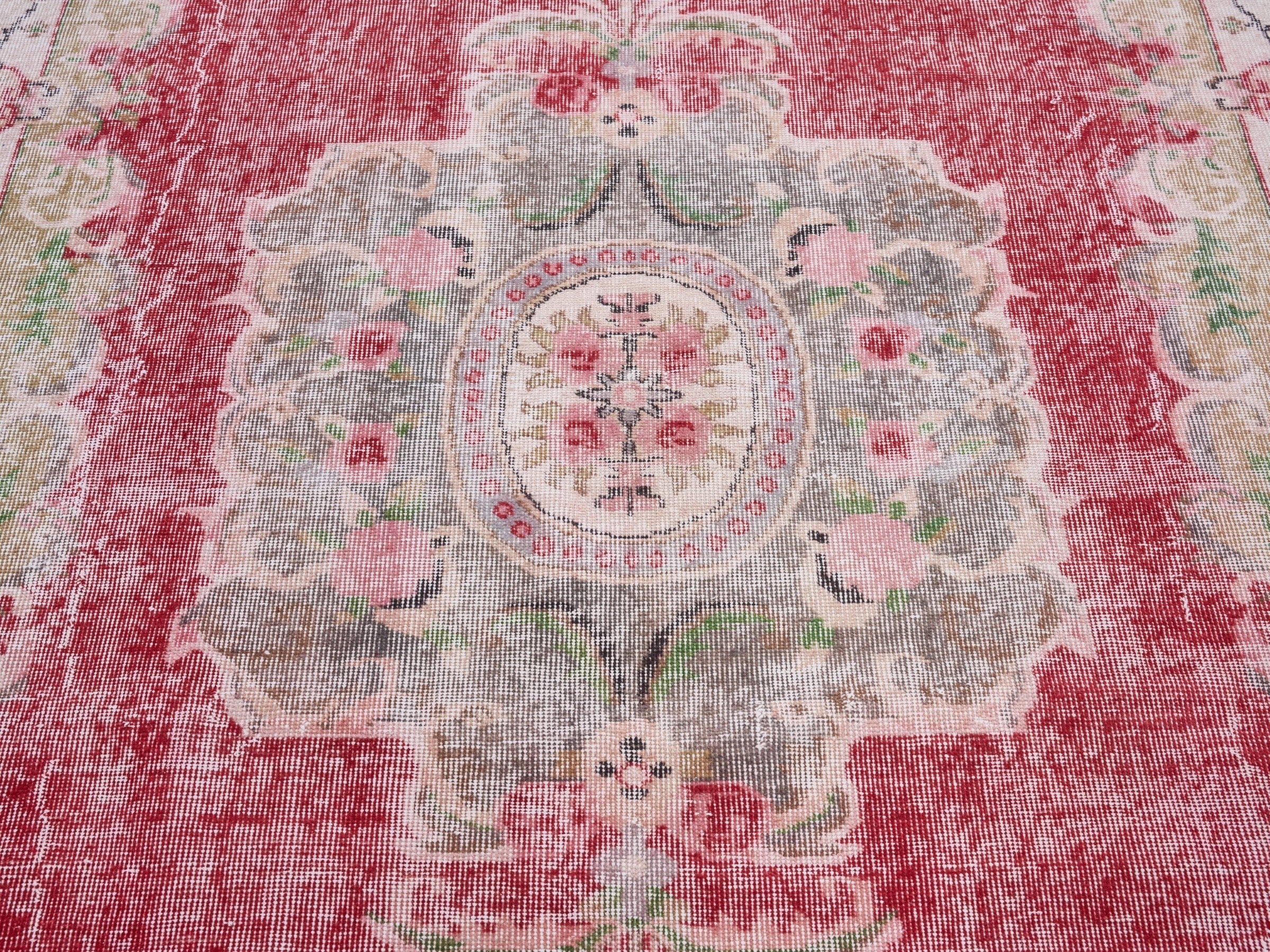 Turkish Manisa area rug in faded red and muted pink, view 4 of 10