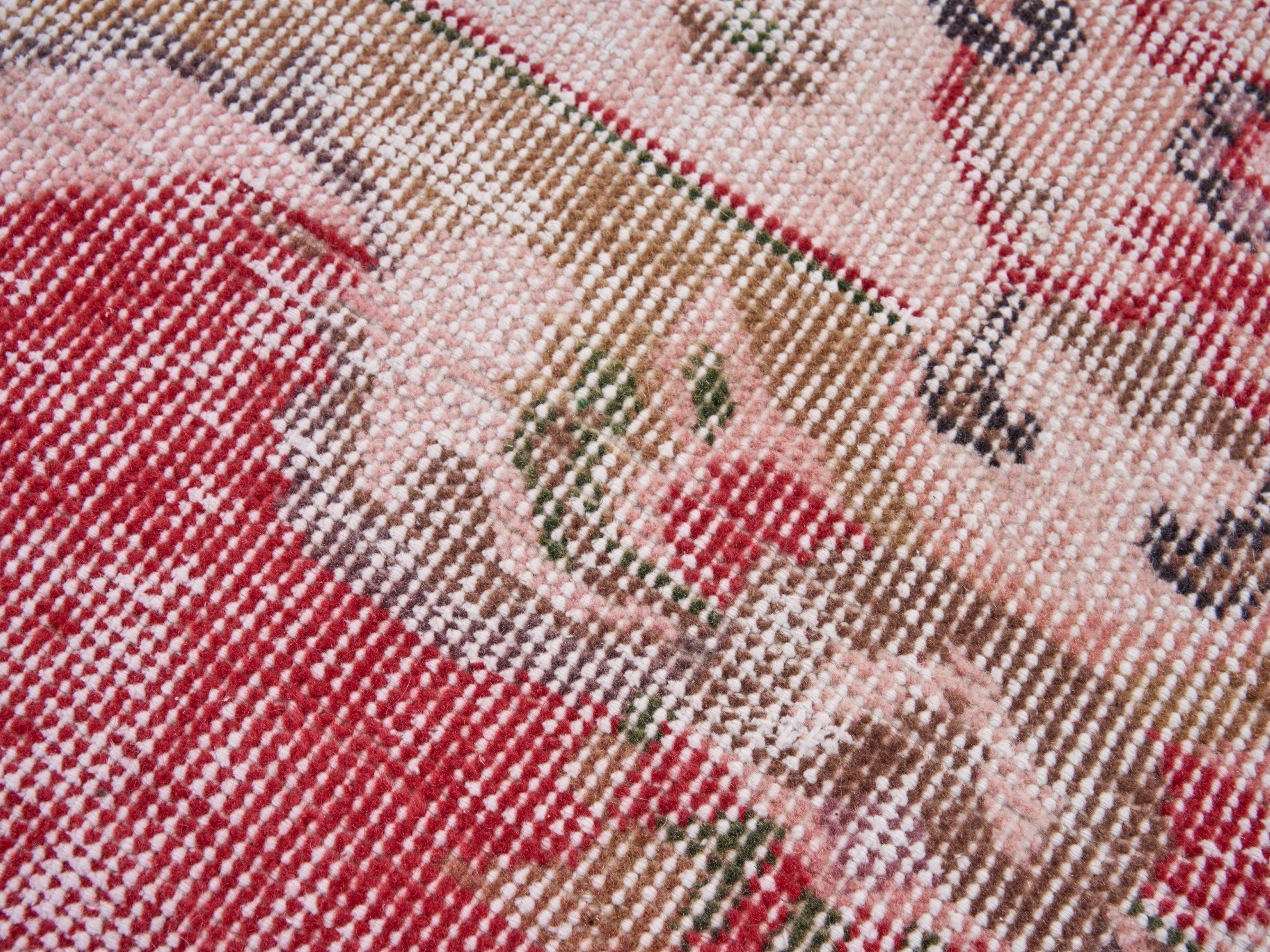 Turkish Manisa area rug in faded red and muted pink, view 7 of 10