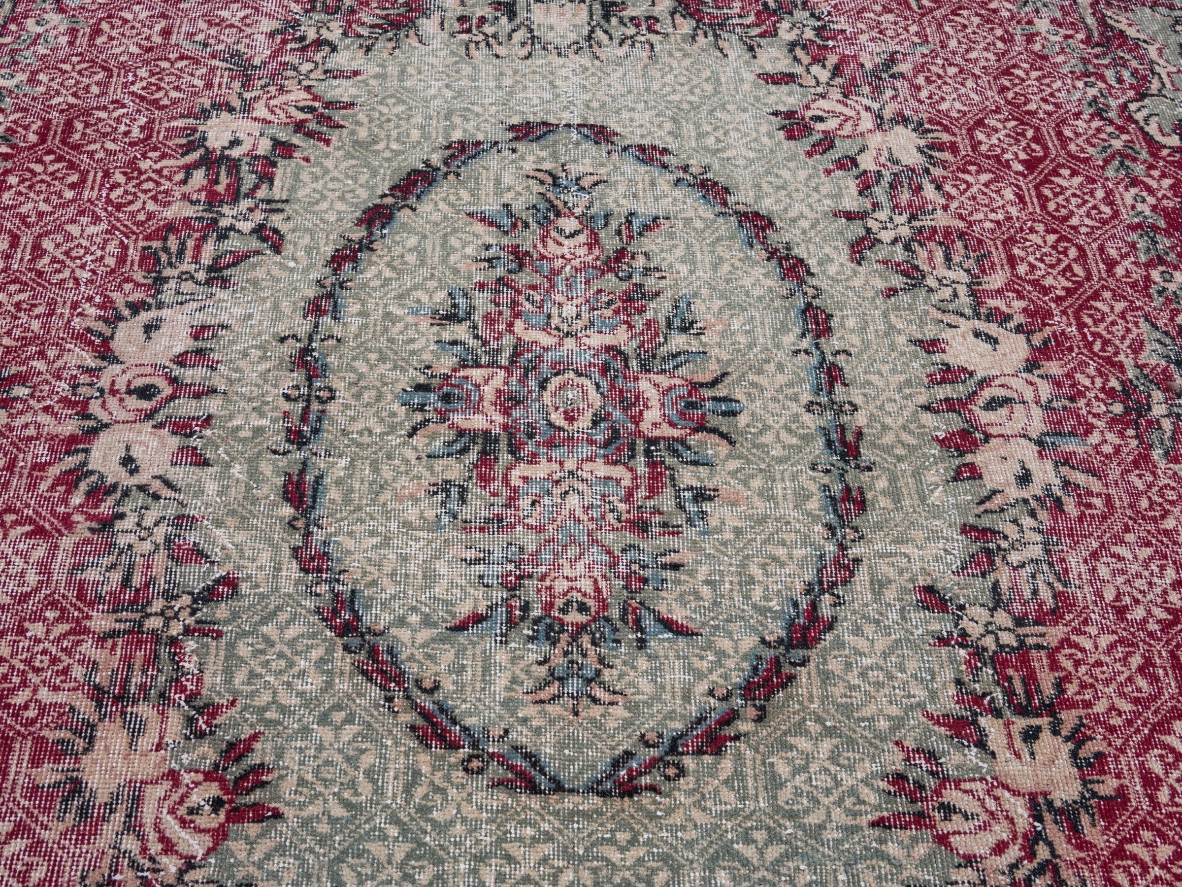 Turkish Isparta area rug in burgundy and muted pink, view 4 of 10