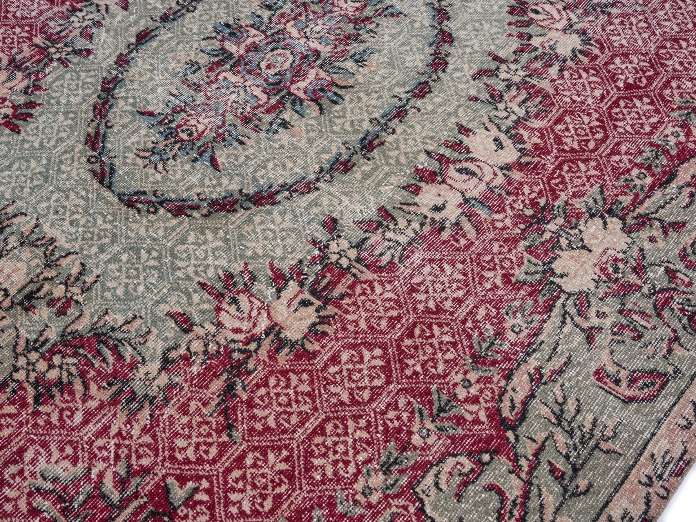 Turkish Isparta area rug in burgundy and muted pink, view 5 of 10