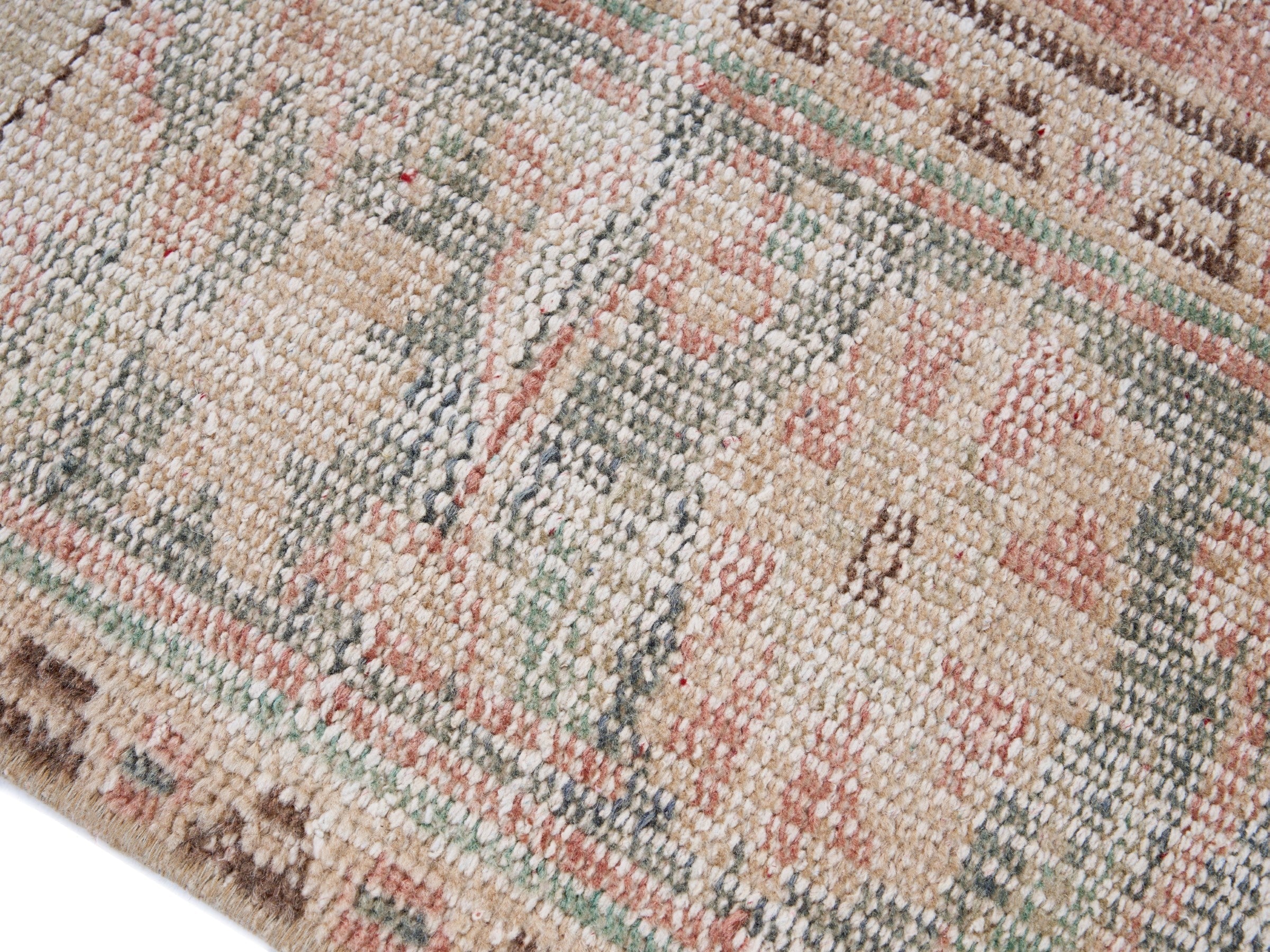 Turkish Manisa area rug in muted pink and rose, view 6 of 10
