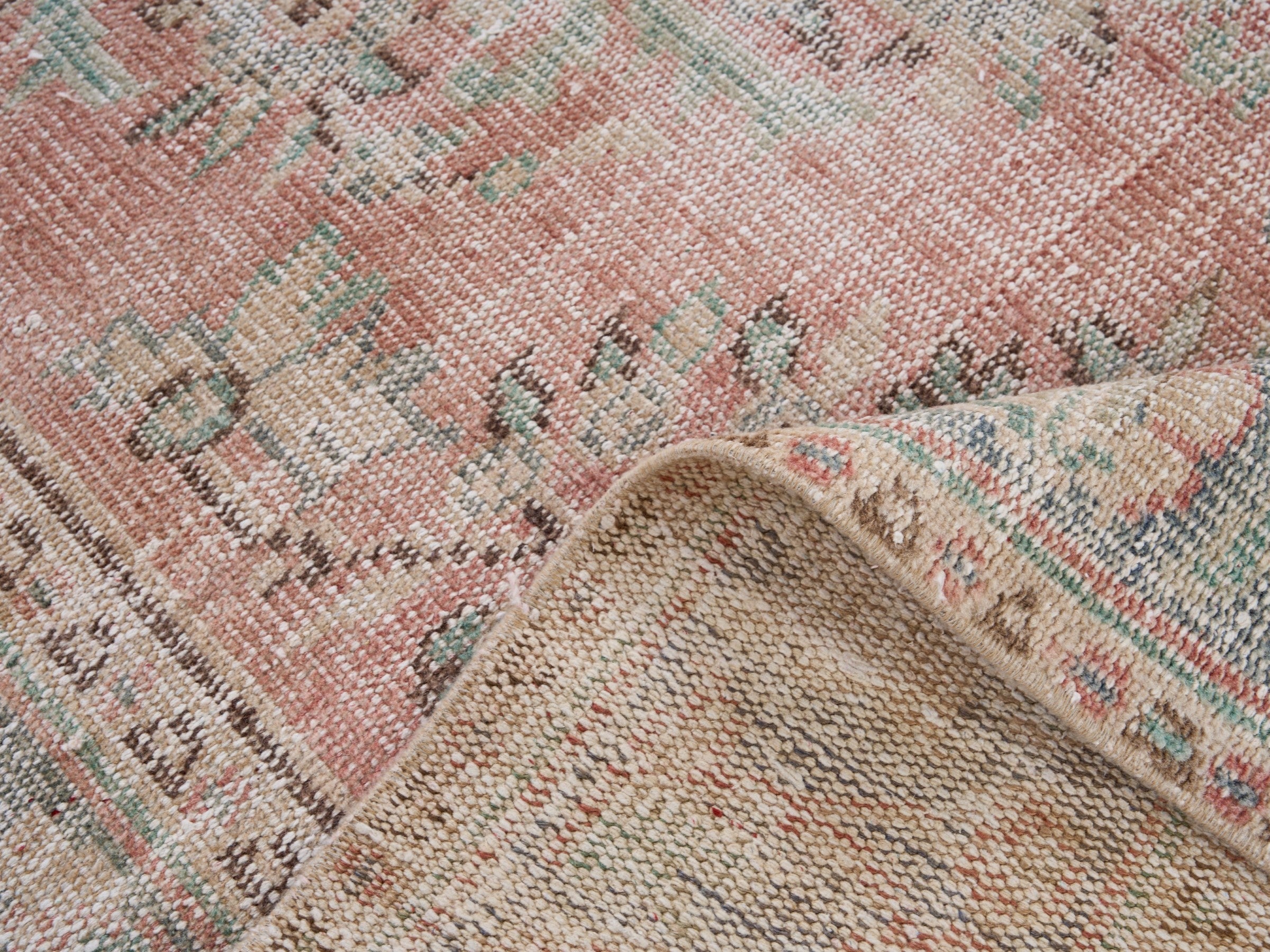 Turkish Manisa area rug in muted pink and rose, view 9 of 10
