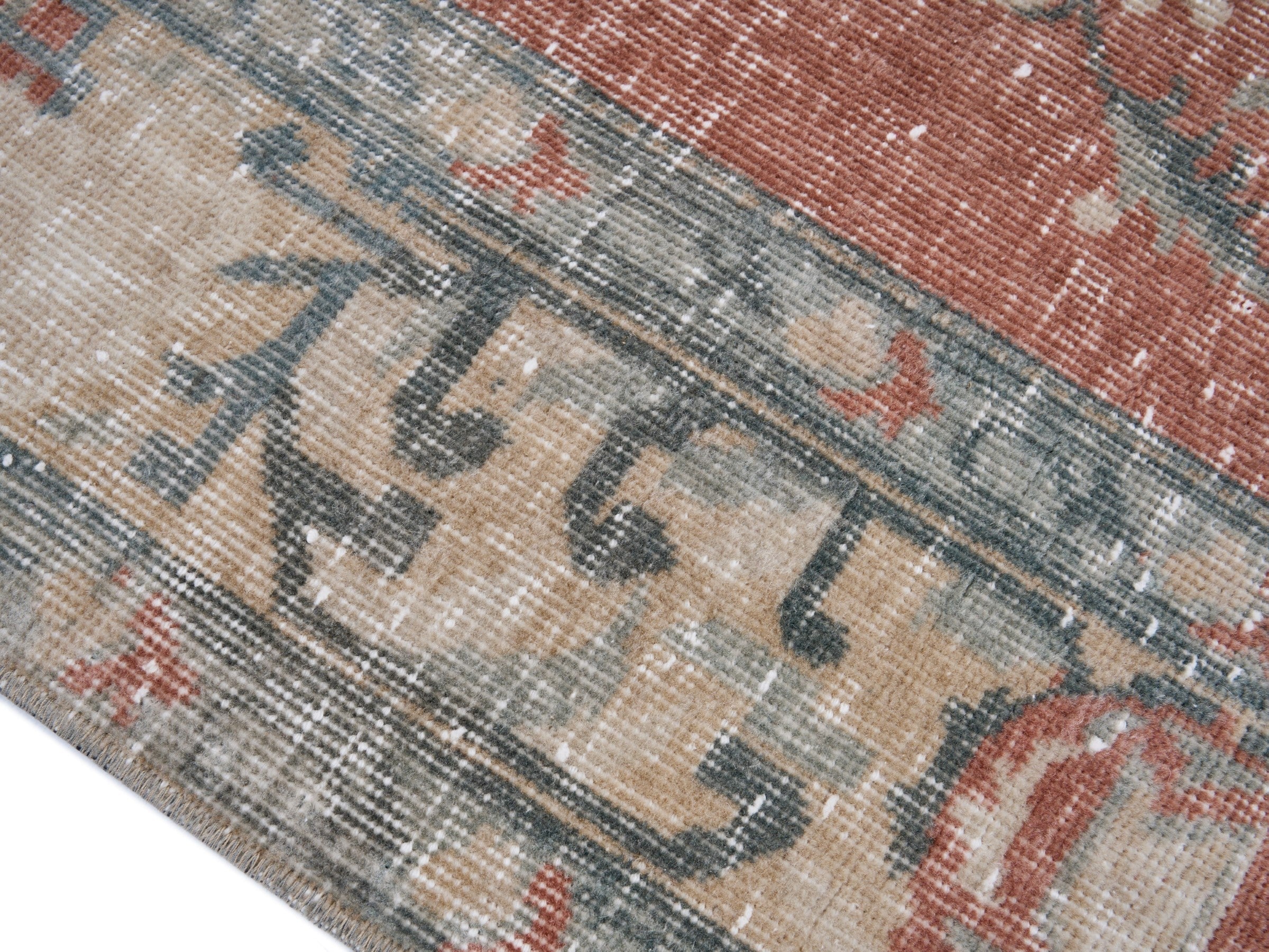 Turkish Isparta area rug in faded red and cream, view 6 of 10