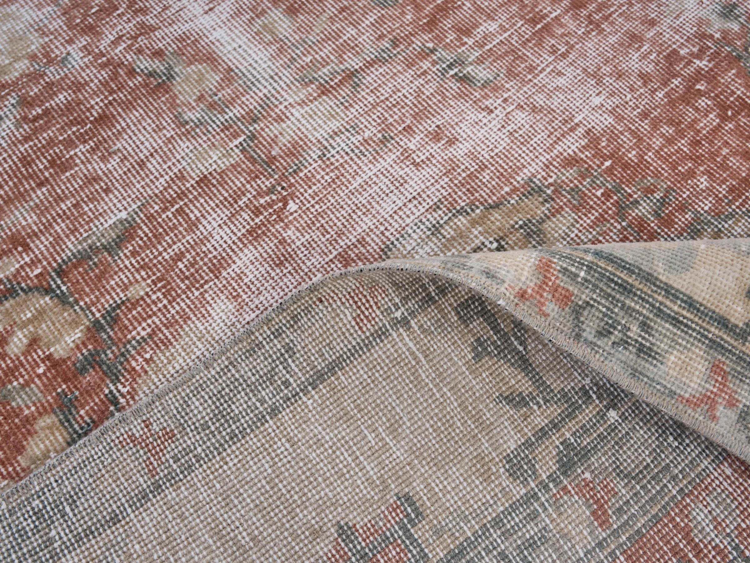 Turkish Isparta area rug in faded red and cream, view 9 of 10
