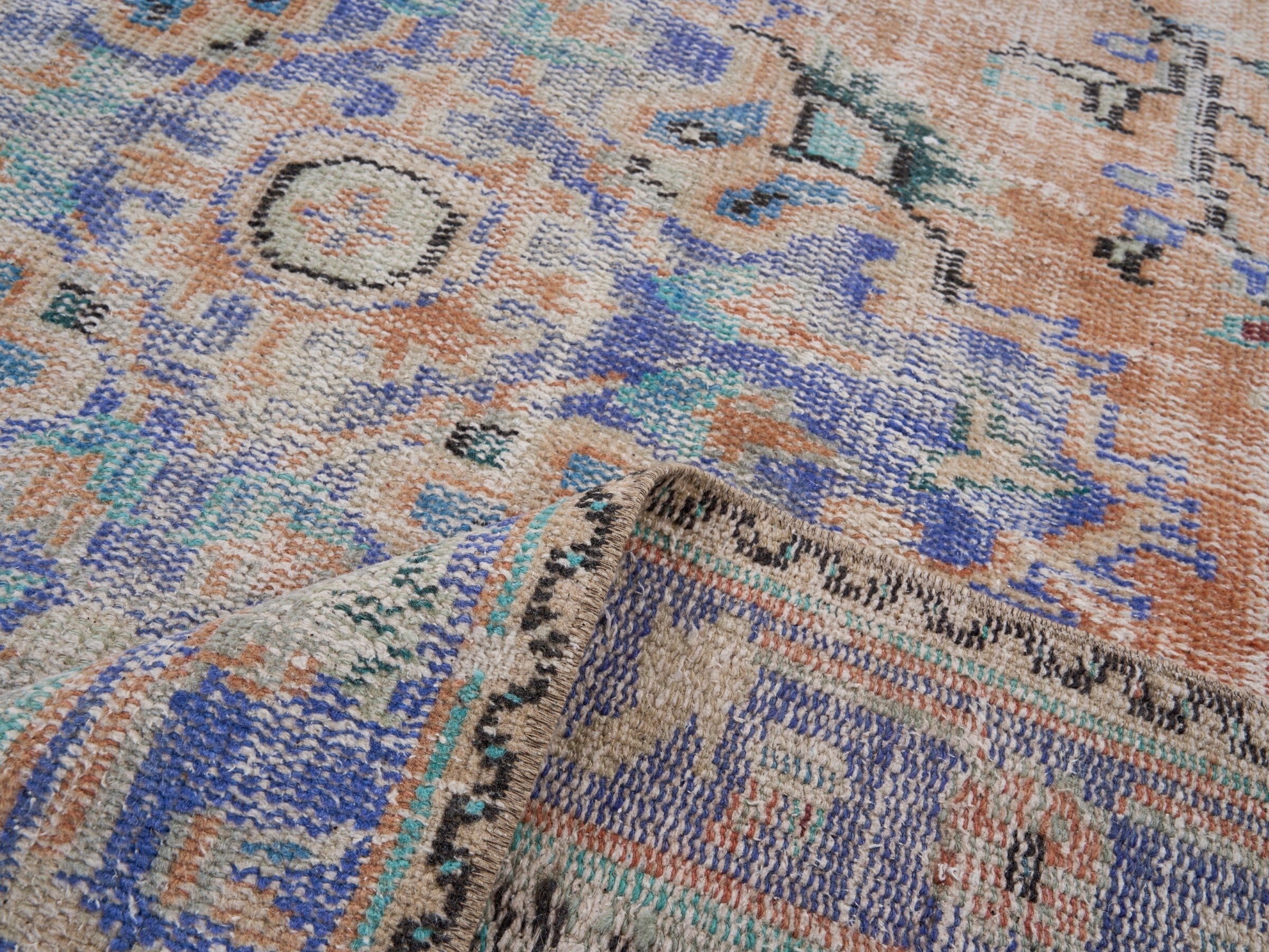 Turkish Manisa area rug in terracotta and blue, view 9 of 10