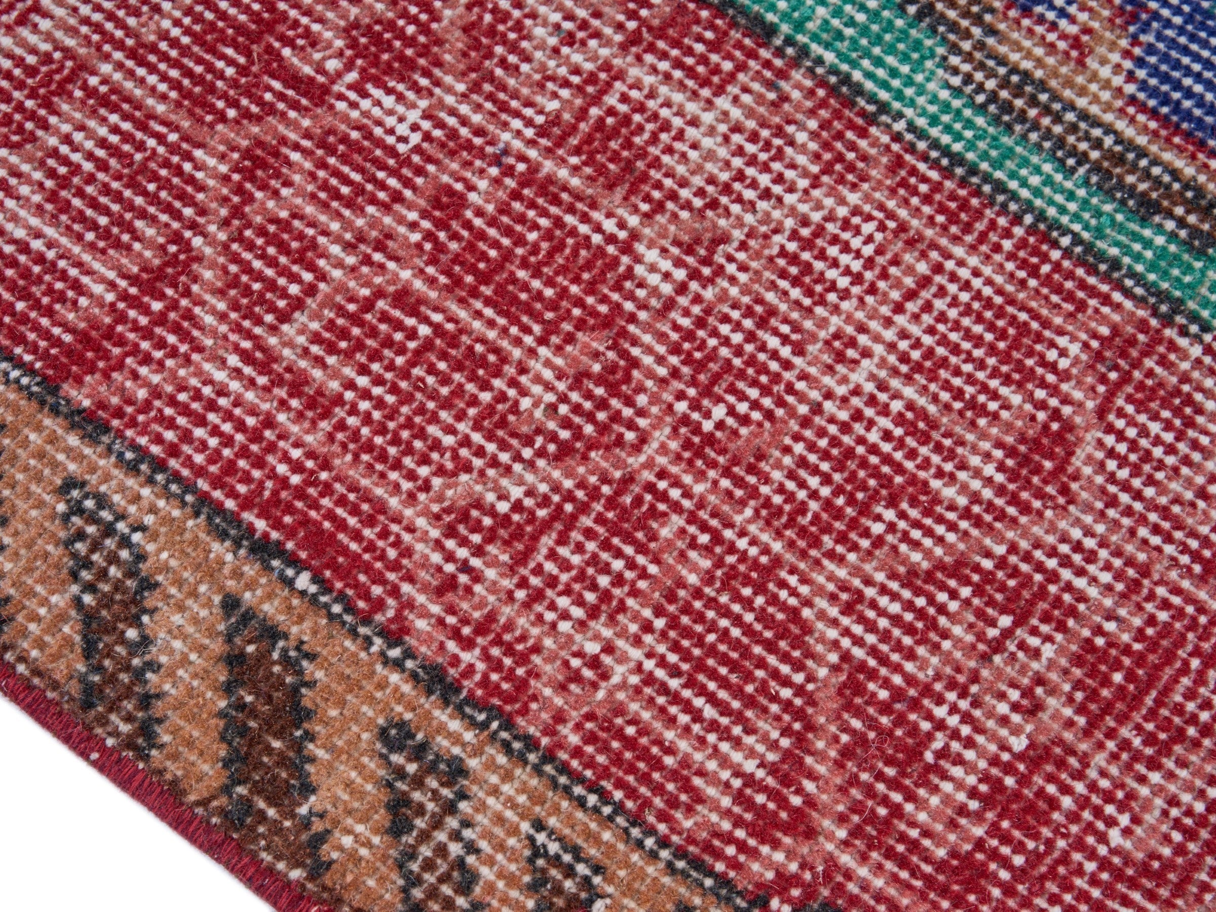 Turkish Isparta area rug in deep indigo and rose, view 6 of 10