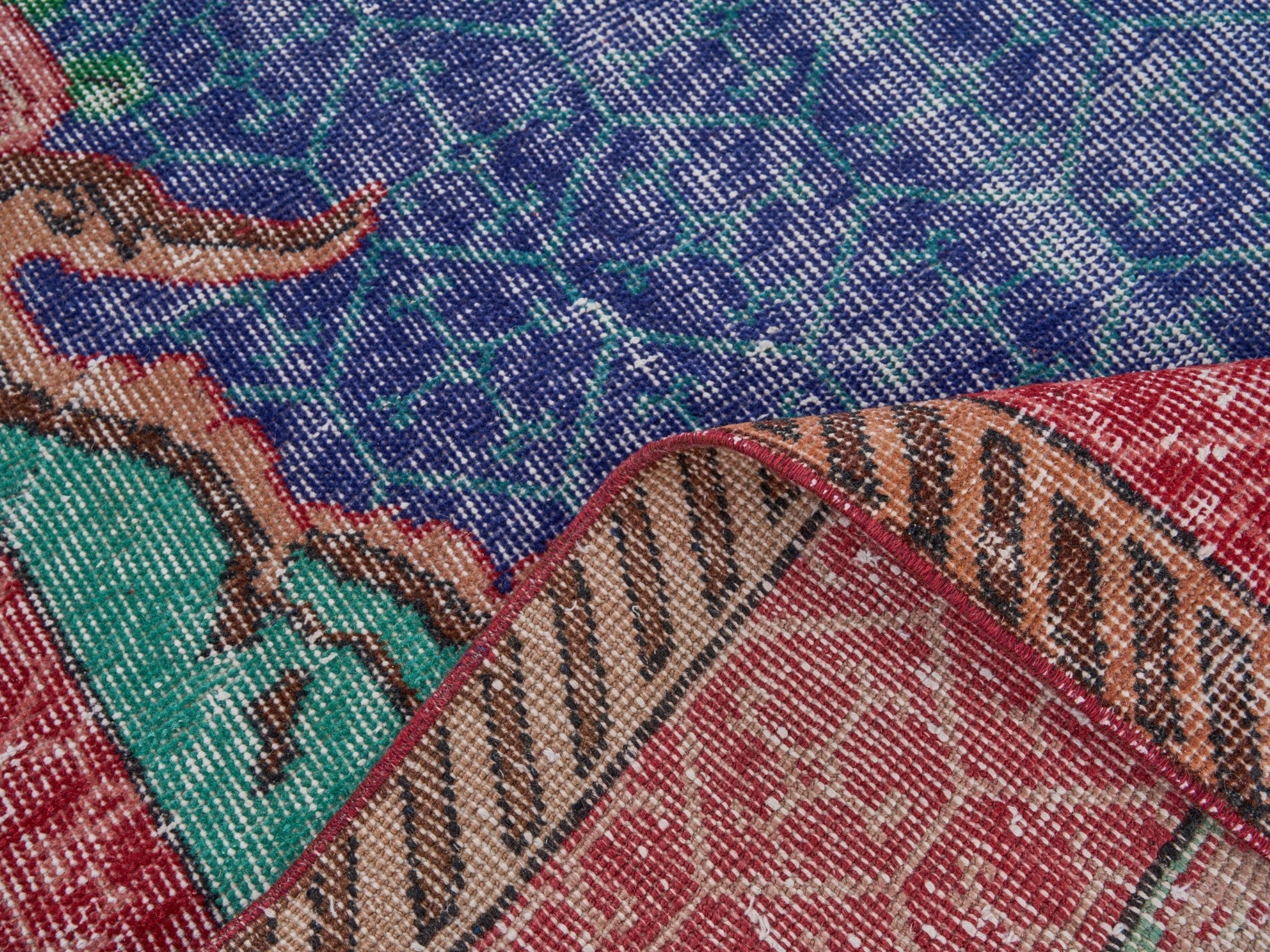Turkish Isparta area rug in deep indigo and rose, view 9 of 10