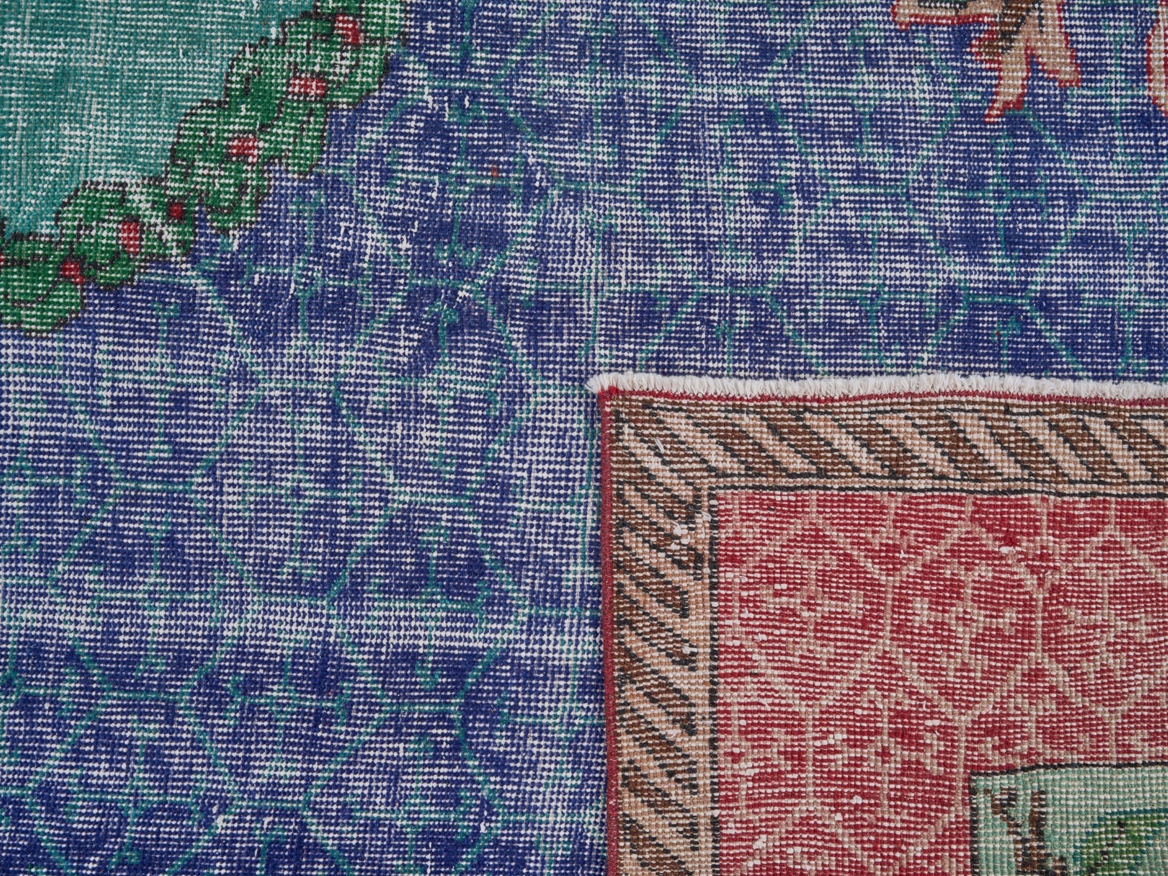 Turkish Isparta area rug in deep indigo and rose, view 10 of 10