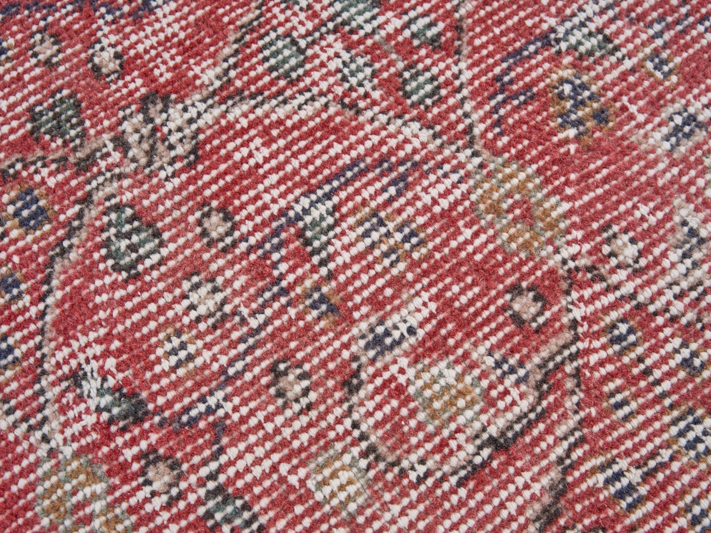 Turkish Isparta area rug in faded red and greige, view 7 of 10