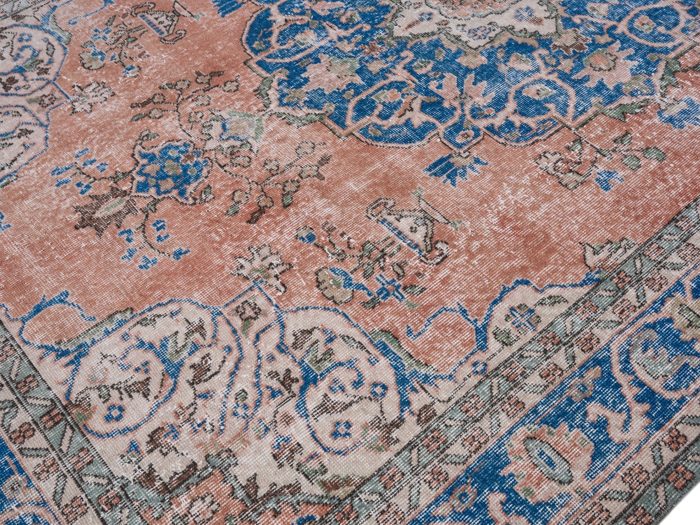Turkish Isparta area rug in terracotta and navy, view 5 of 10